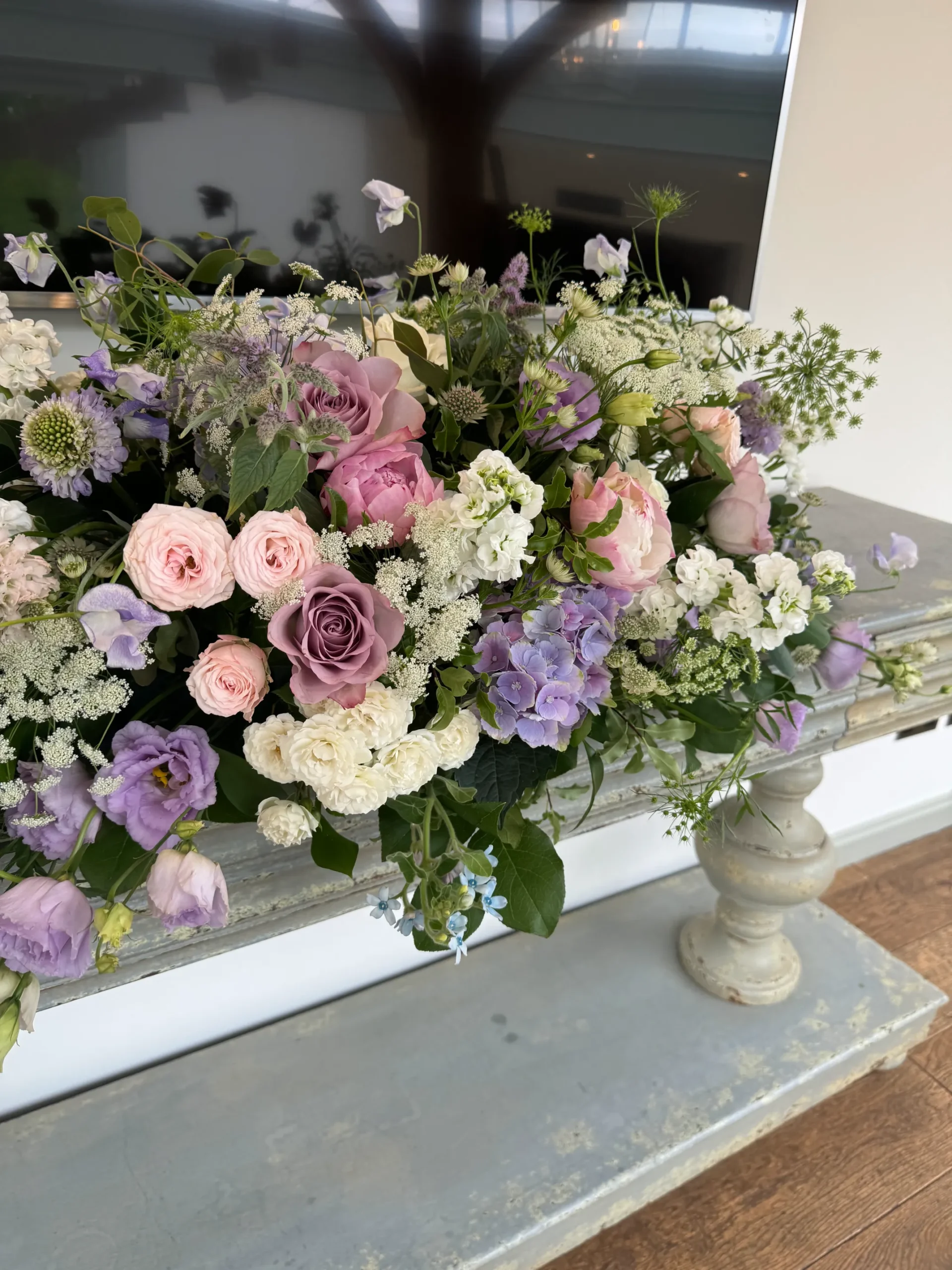 Pastel floral funeral tribute