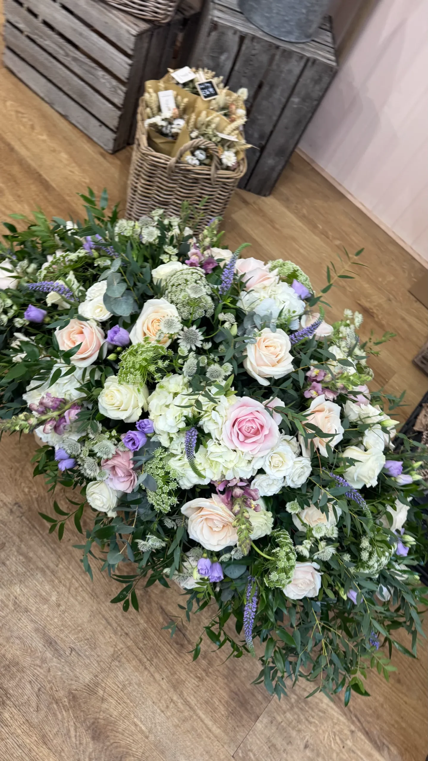 Pastel casket spray