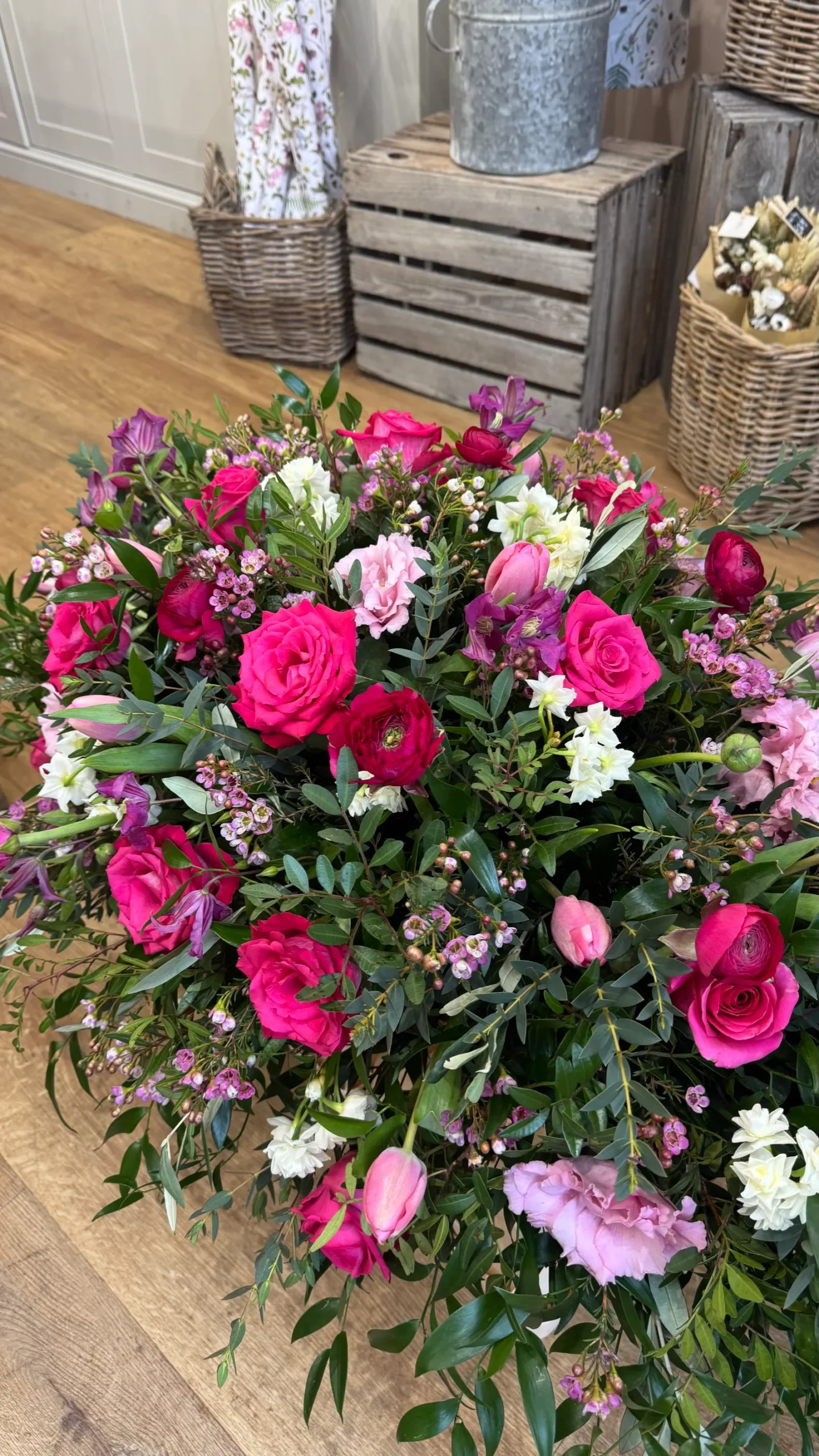 Pink floral funeral tribute