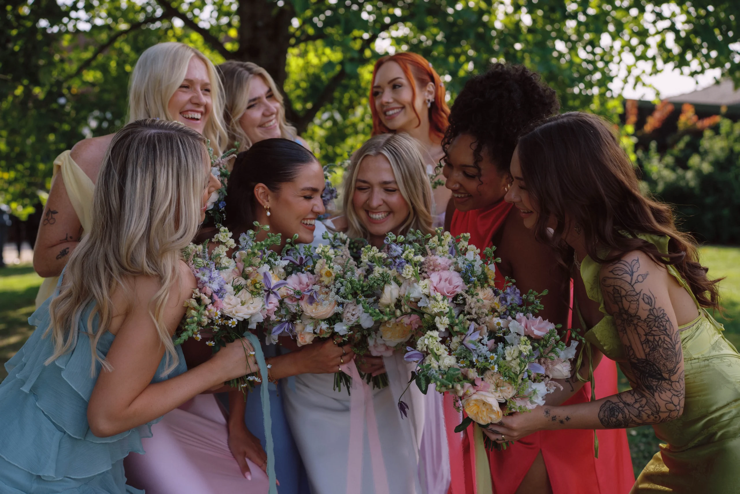 Colourful bridesmaid bouquets at Gate Street Barn