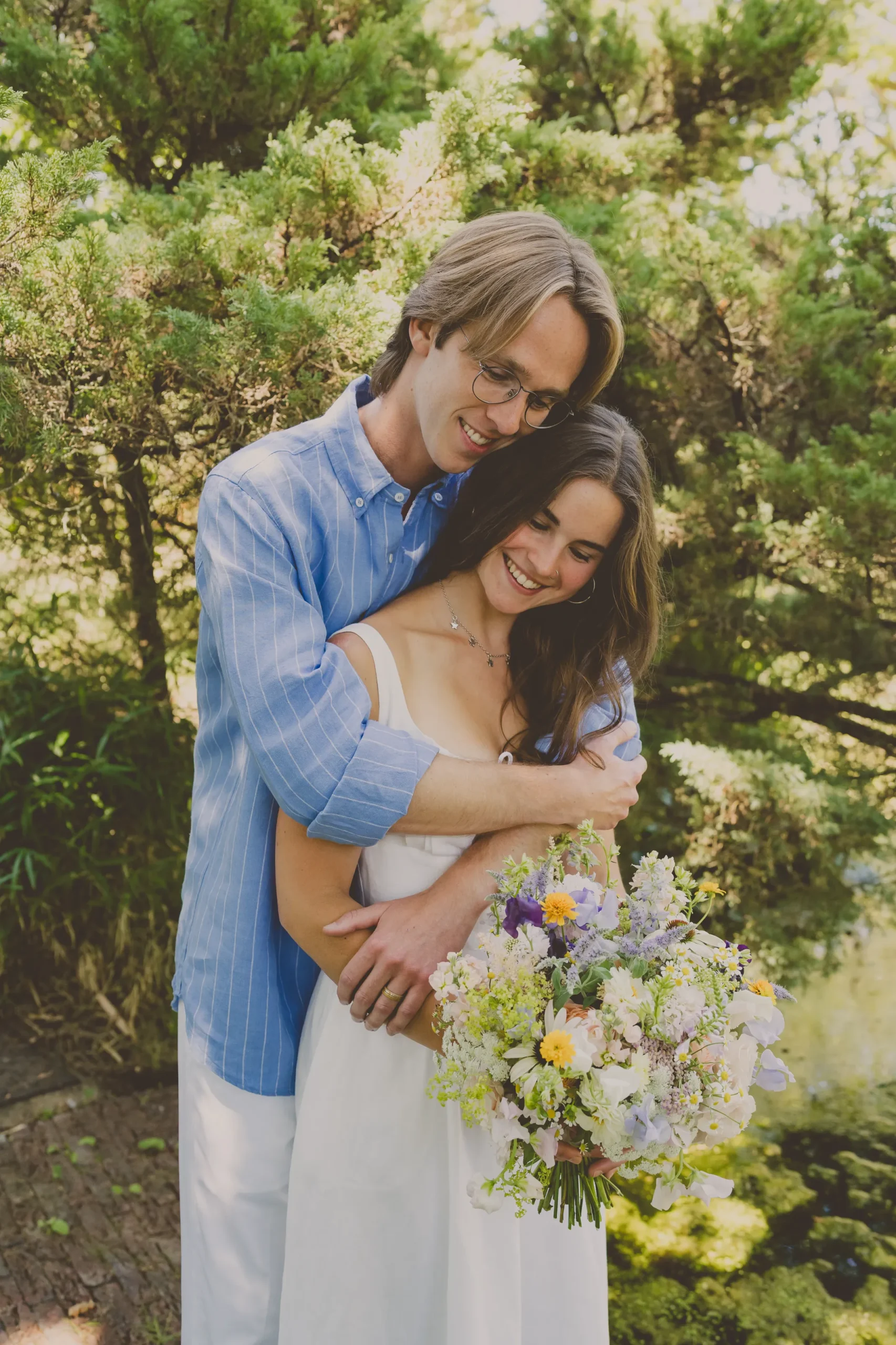 Lauren and Chris during their relaxed July wedding at Ridge Farm