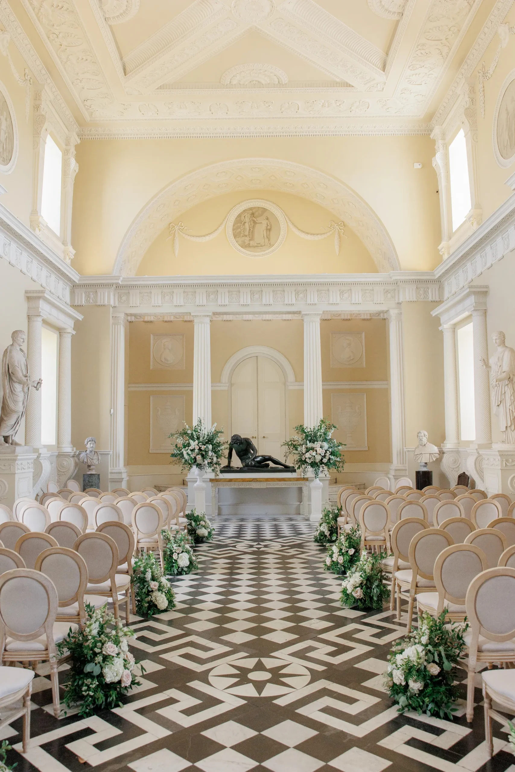 Syon Park ceremony aisle flowers for Olivia and Jack