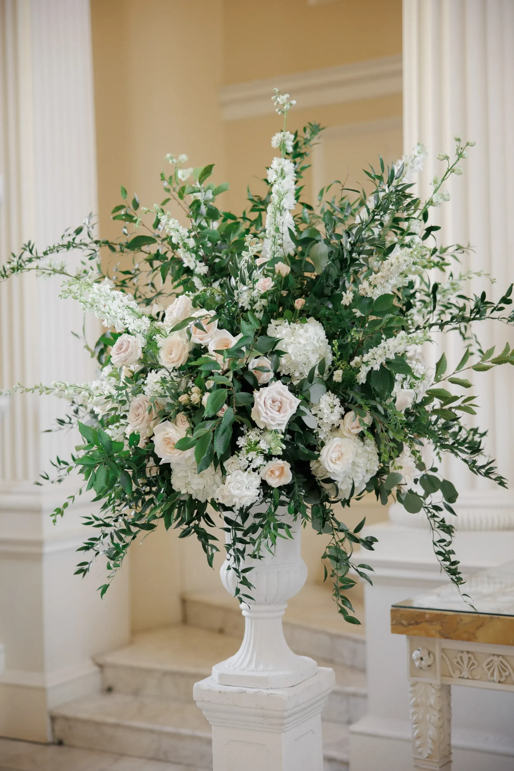 White hydrangea and blush rose wedding flowers at Syon Park