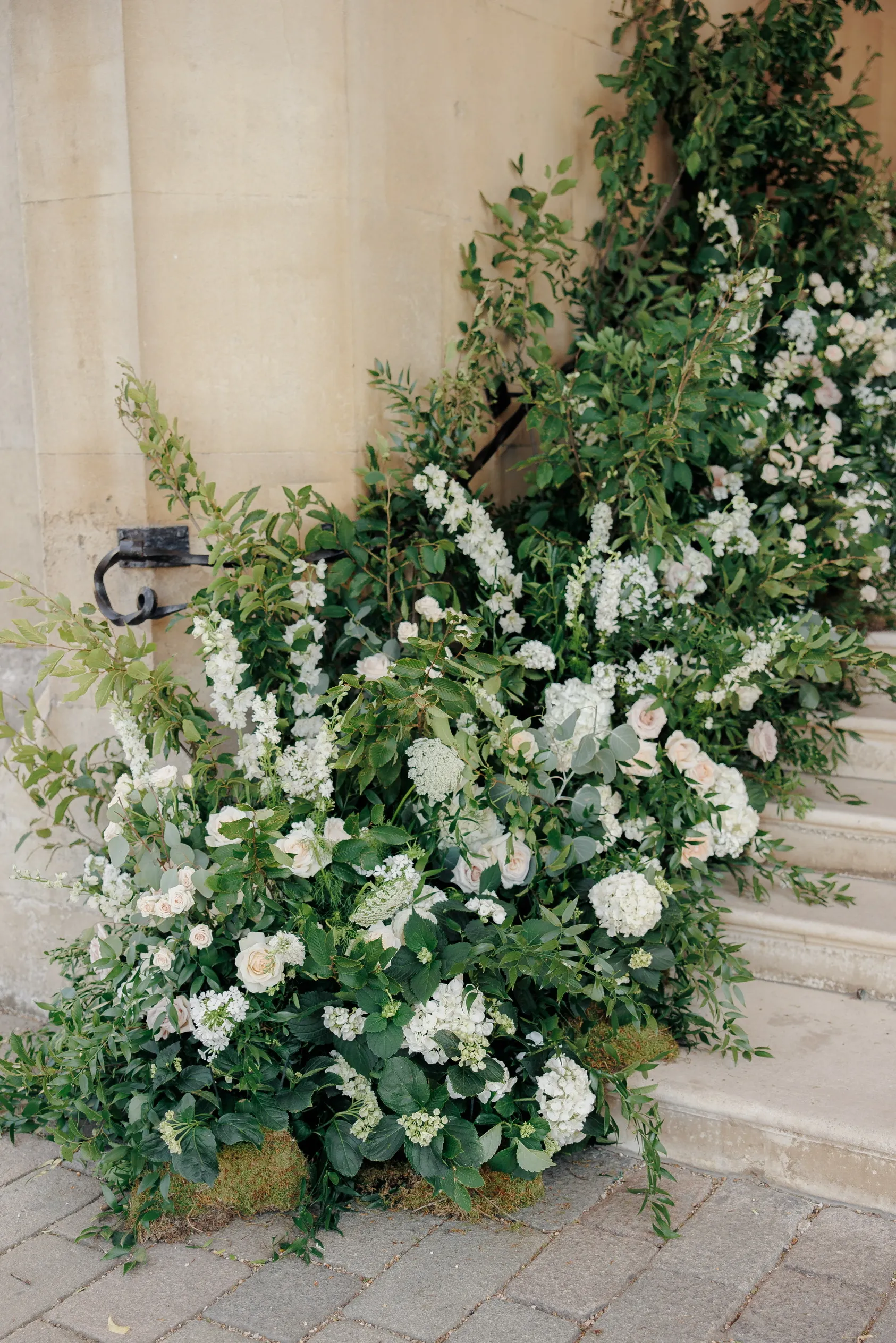 White delphiniums, roses and hydrangeas for a Syon Park wedding