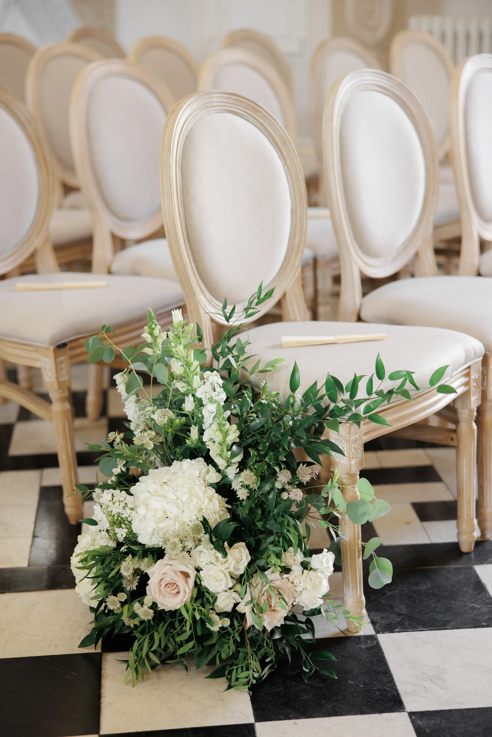 White and blush aisle flowers at Syon Park
