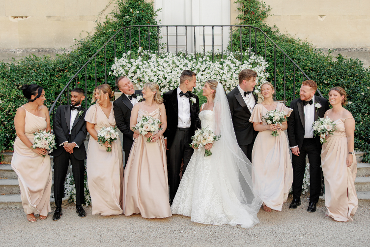Olivia and Jack with their wedding party outside Syon House