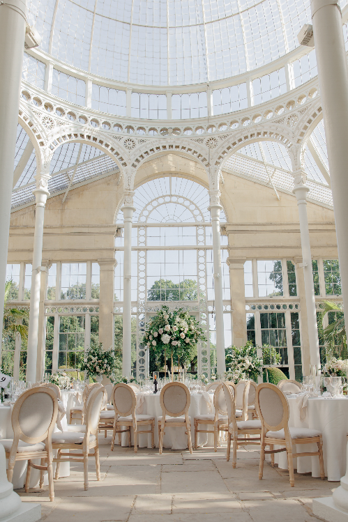 The Great Conservatory at Syon Park set for Olivia and Jack's wedding reception